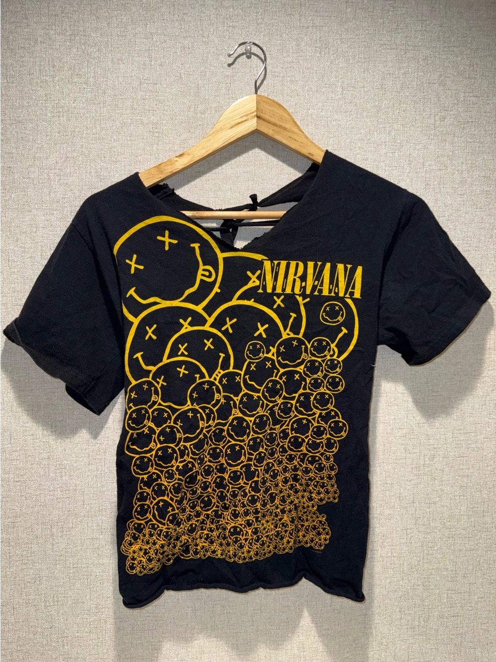 {Nirvana} Distressed Black T-Shirt with Yellow Smile Graphic